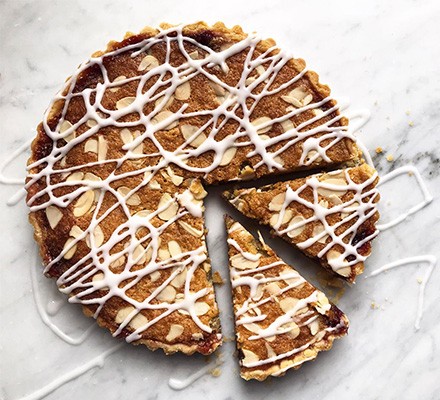 Bakewell tart with two slices cut out