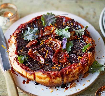 A plate serving beetroot & red onion tarte tatin