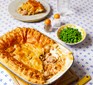 One large chicken & bacon pie with peas