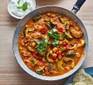 Courgette curry in a frying pan