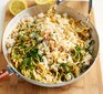 Crab linguine with chilli and parsley in a wide pan