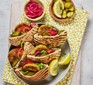 Falafel pitta wraps with pickled onions and cucumber on the side