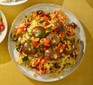 Lentil, ras-el hanout & date ‘meatballs’ with olive salsa and couscous
