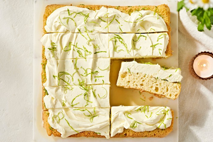 Lime tres leches cake cut into pieces
