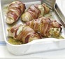 Four chicken fillets wrapped in bacon