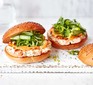 Two prawn & salmon burgers with green salad