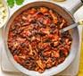 Pulled chicken & black bean chilli in a large pan