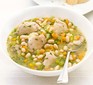 Chicken & white bean stew in bowl with spoon