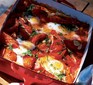 Tomato baked eggs in a baking dish