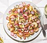 Roast new potatoes & radishes served on a sharing platter