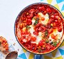 Saucy bean baked eggs in a pan