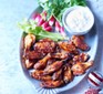 Sticky bourbon BBQ wings with blue cheese dip
