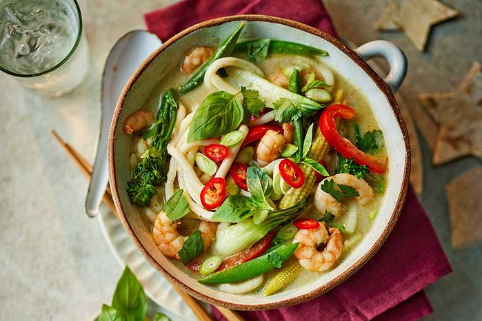 Thai curry noodle soup served in a bowl
