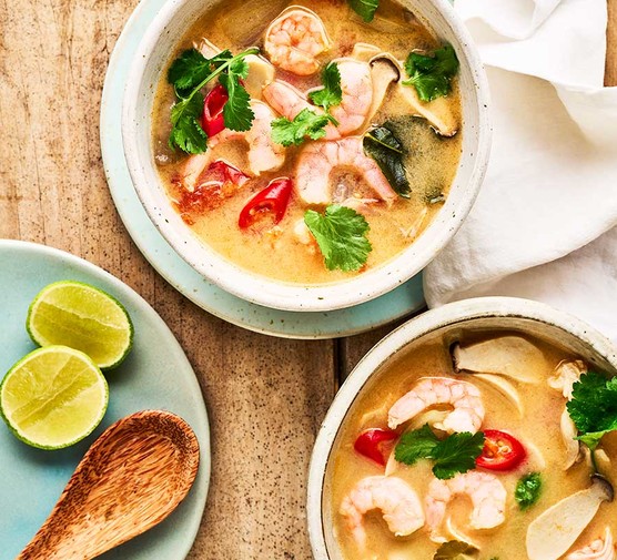 Tom yum soup with prawns in two bowls